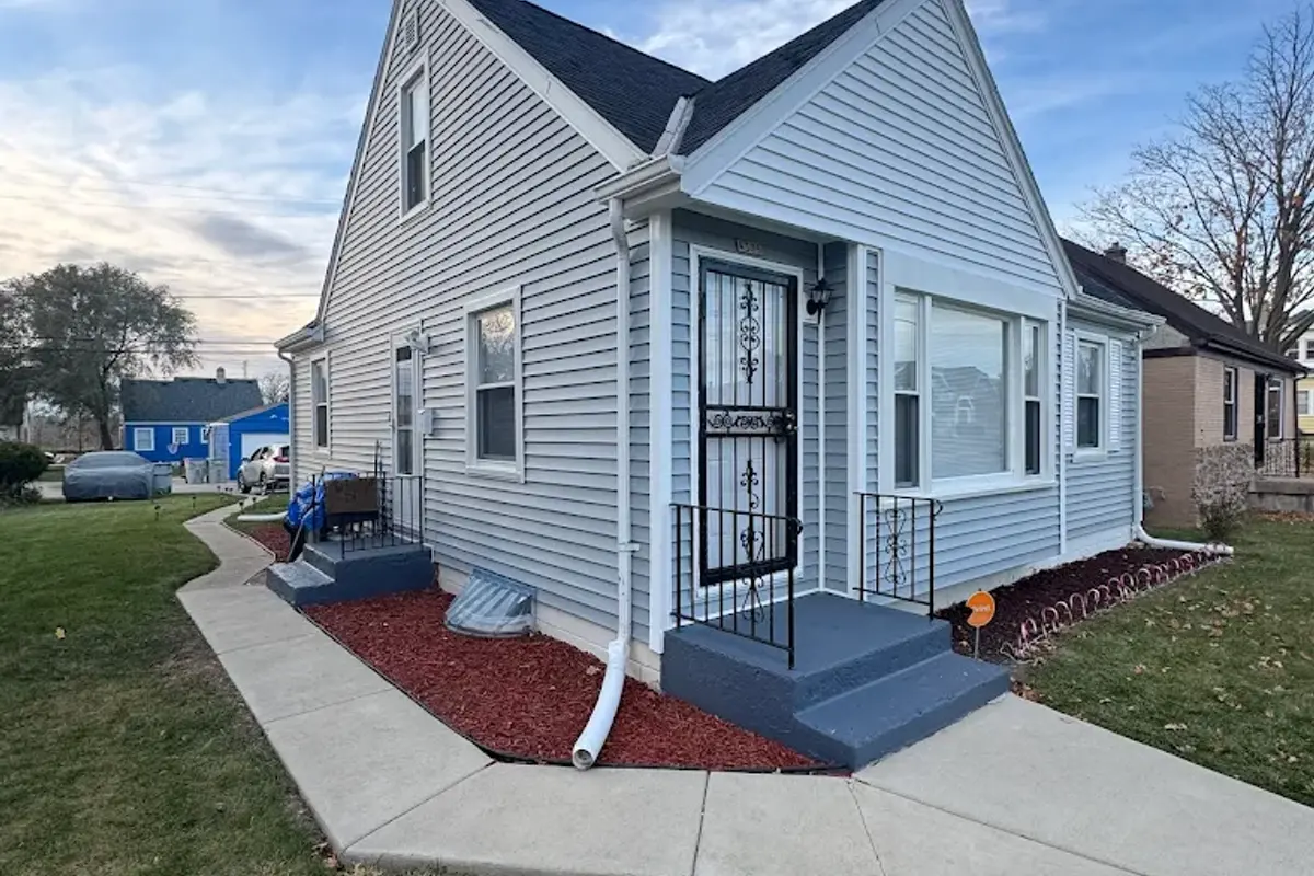 Completed Apexium Roofing replacement on a Wauwatosa, WI home with a front dormer