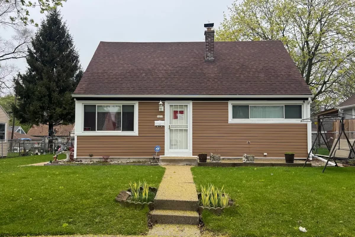 Completed Apexium Roofing replacement on a brick ranch in West Milwaukee, WI