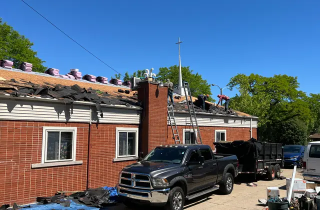 Full tear-off underway on an Apexium Roofing replacement in Grafton, WI