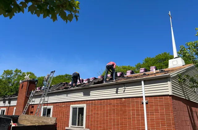 New shingle bundles staged on a roof by the Apexium Roofing crew in Grafton, WI