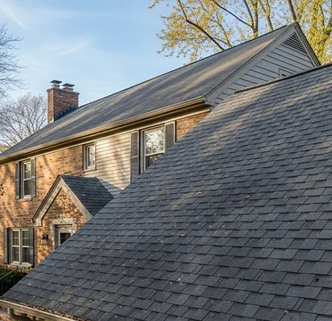 Residential roof in Milwaukee showing visible signs of aging and wear
